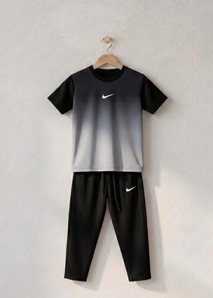 Black and gray outfit on a hanger against a light gray background